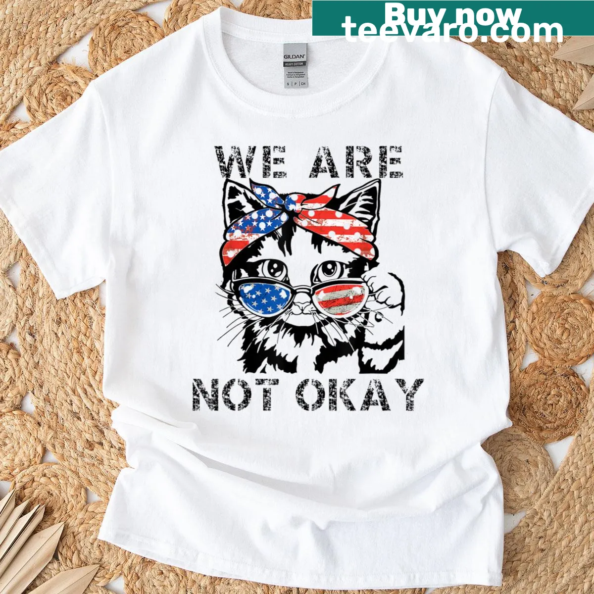 Distressed American flag design with a cute cat and the phrase We Are Not Okay. — on a men's t-shirt