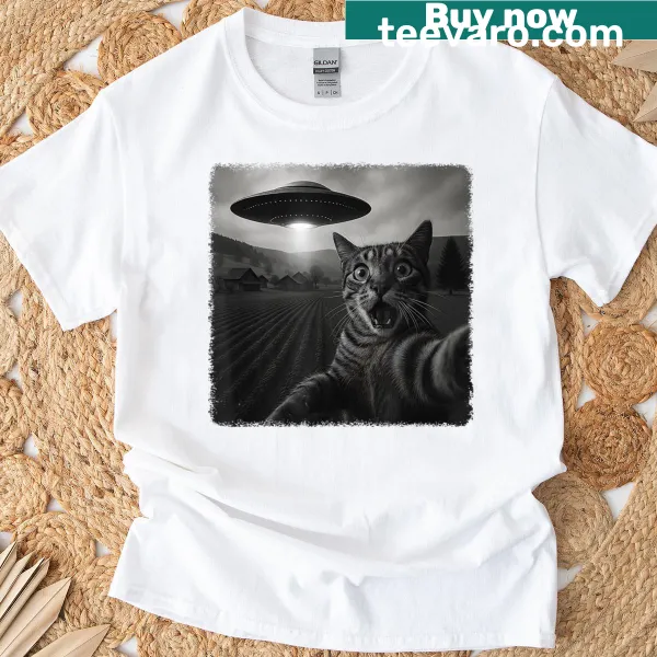 Cat taking a selfie with an alien in a UFO graphic T-shirt