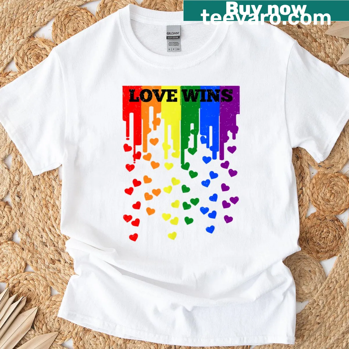 T-shirt with 'Love Wins' text and rainbow flag design promoting equality — on a men's t-shirt