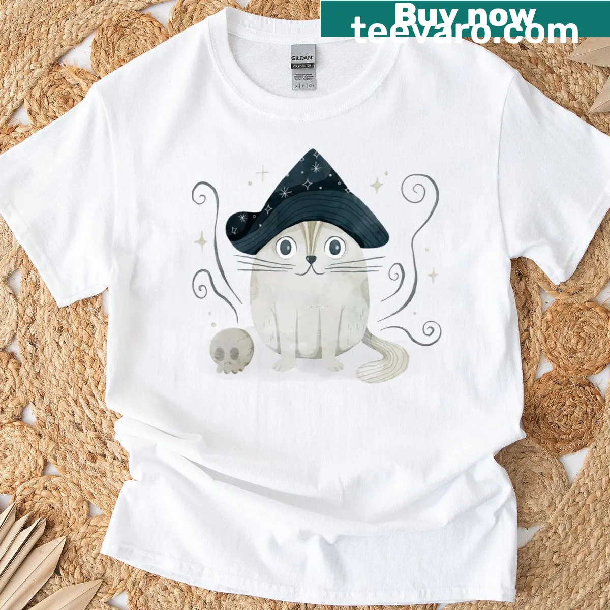 Whimsical T-shirt featuring a cat in a witch's hat illustration — on a men's t-shirt