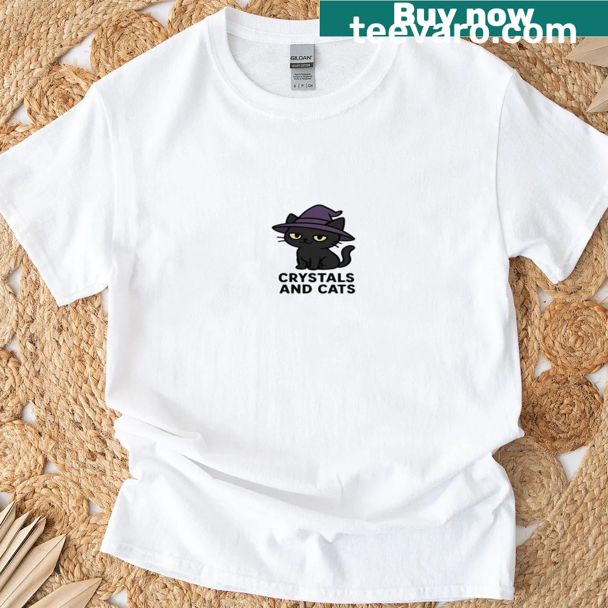 T-shirt featuring a cat design surrounded by crystals. — on a men's t-shirt