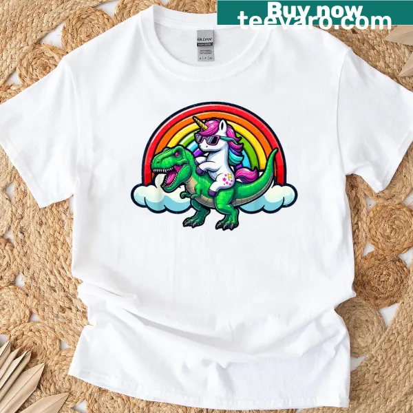 Whimsical T-shirt featuring a unicorn on a T-rex with rainbow flag
