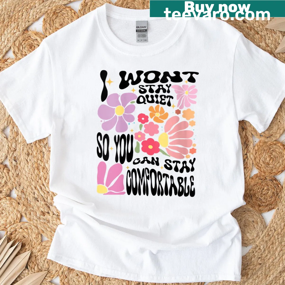Floral graphic with bold text reading 'I Won't Stay Quiet' on a women's tee. — on a men's t-shirt