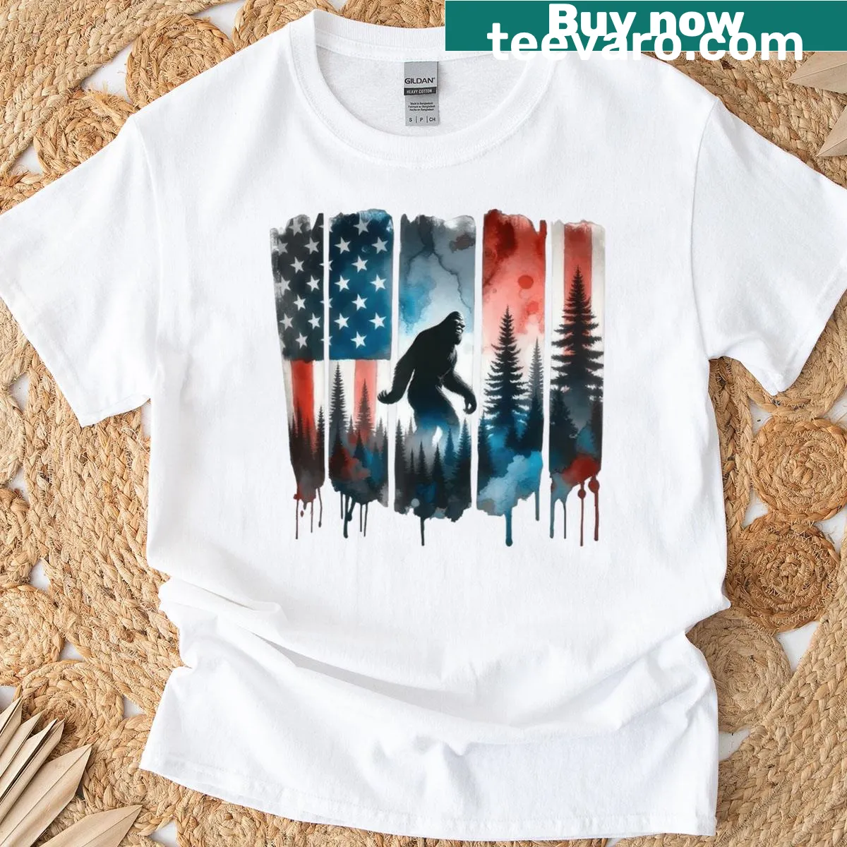 Patriotic T-shirt featuring Bigfoot silhouette and American flag — on a men's t-shirt