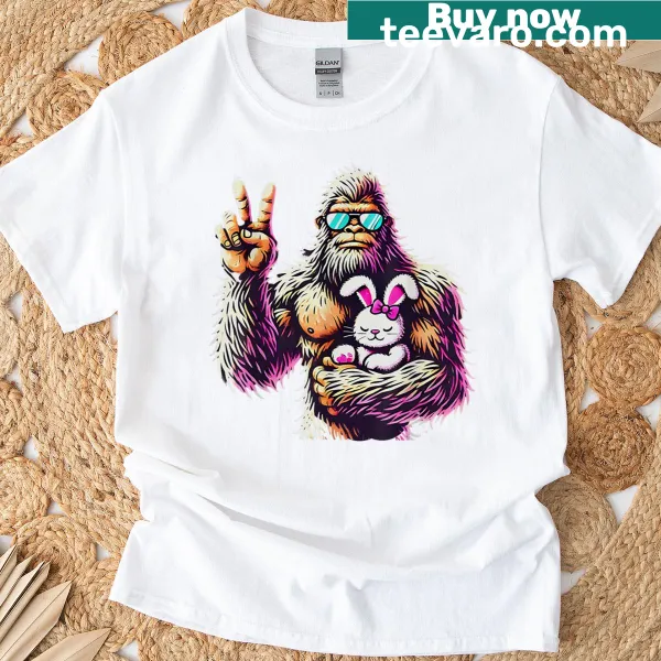 Funny Easter T-shirt featuring Bigfoot and a bunny cartoon.