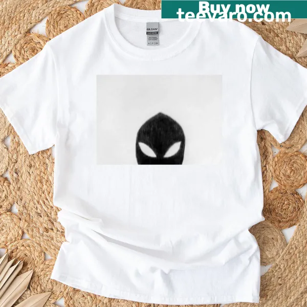 Silhouetted alien graphic on a T-shirt