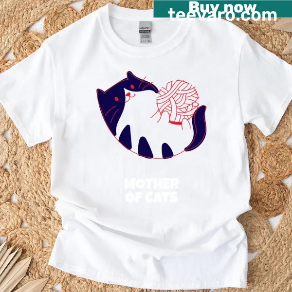 Whimsical cat illustration with yarn on a t-shirt for cat lovers.