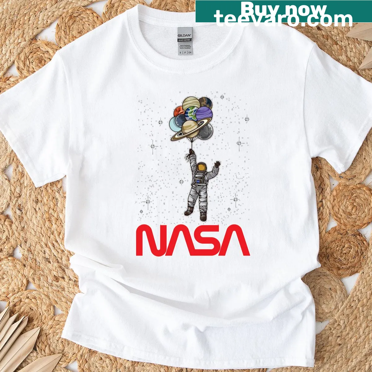 Astronaut with balloons and planets graphic on a T-shirt — on a men's t-shirt