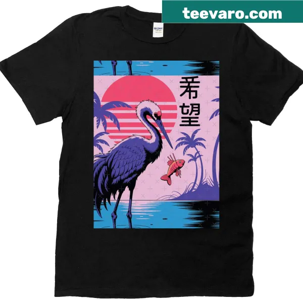 Graphic tee featuring a crane silhouette against a sunset background