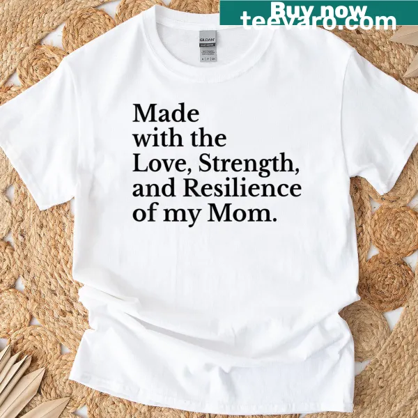 Text graphic honoring love and strength of moms on t-shirt