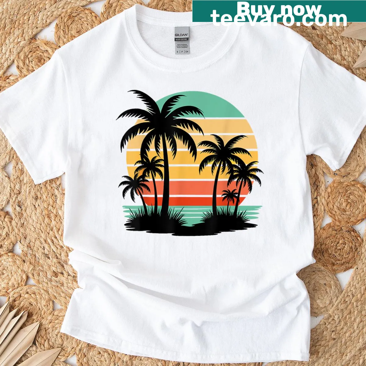 Vintage beach scene with palm trees and sunset graphic — on a men's t-shirt