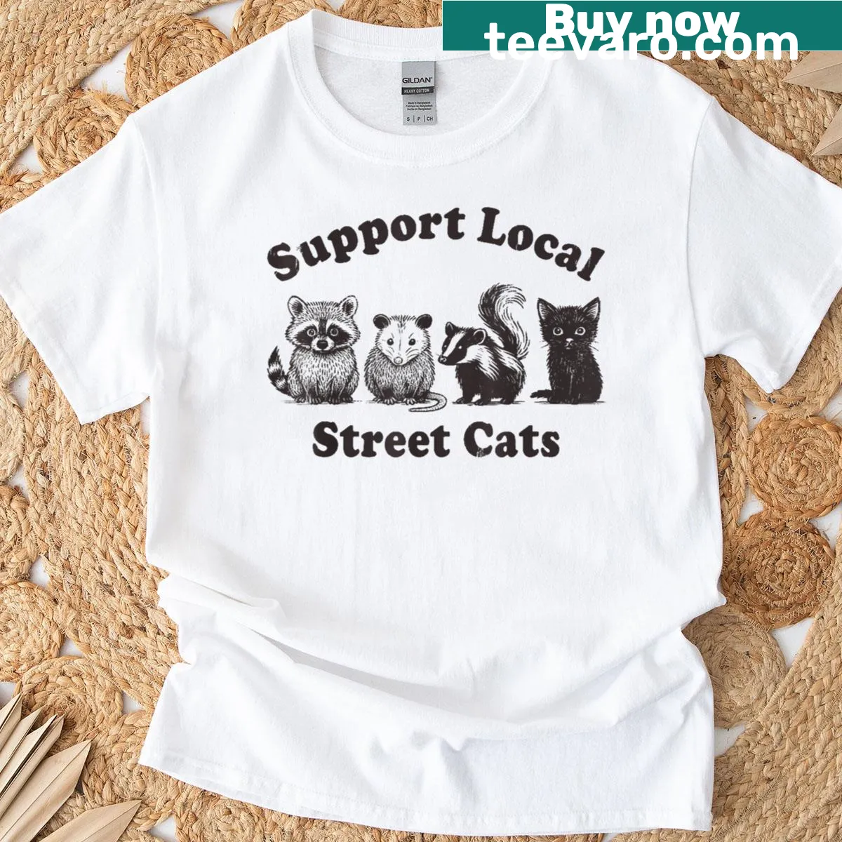Whimsical animal illustration t-shirt featuring street cats and friends — on a men's t-shirt