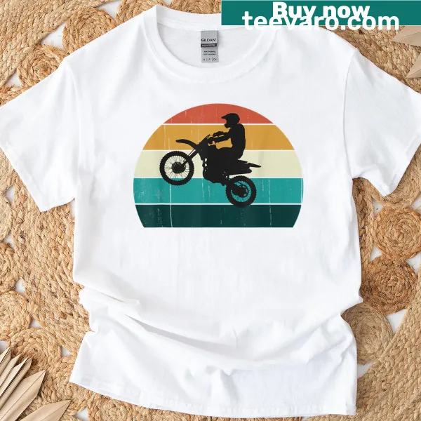 Vintage biker t-shirt featuring retro motorbikes against a sunset design