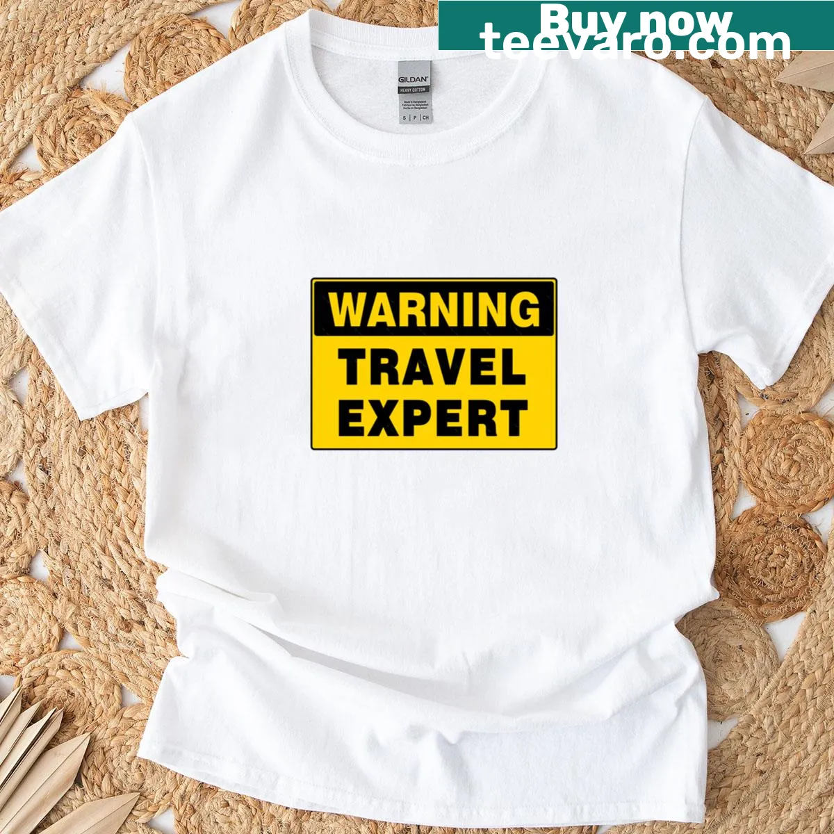 Funny T-shirt with a travel expert warning sign graphic — on a men's t-shirt
