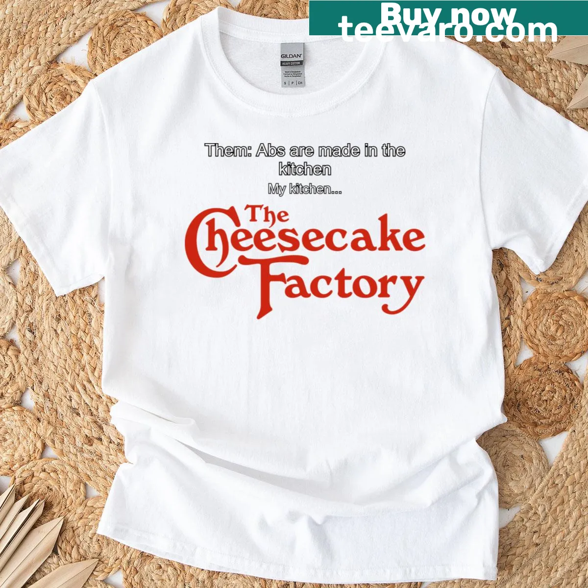 Bold typography t-shirt stating 'Abs Are Made In The Kitchen.' — on a men's t-shirt