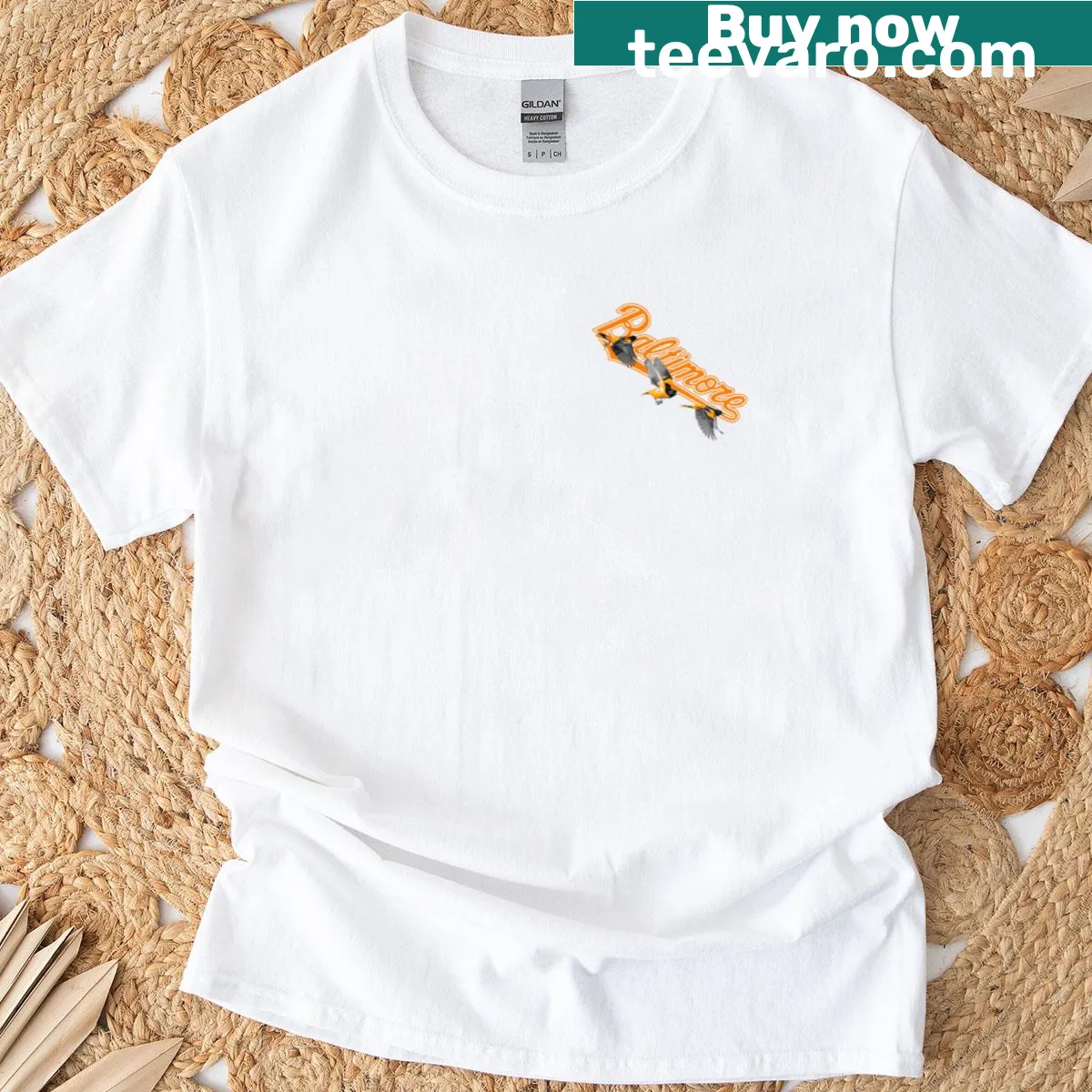 Baltimore Orioles T-shirt with a small positive pattern design — on a men's t-shirt