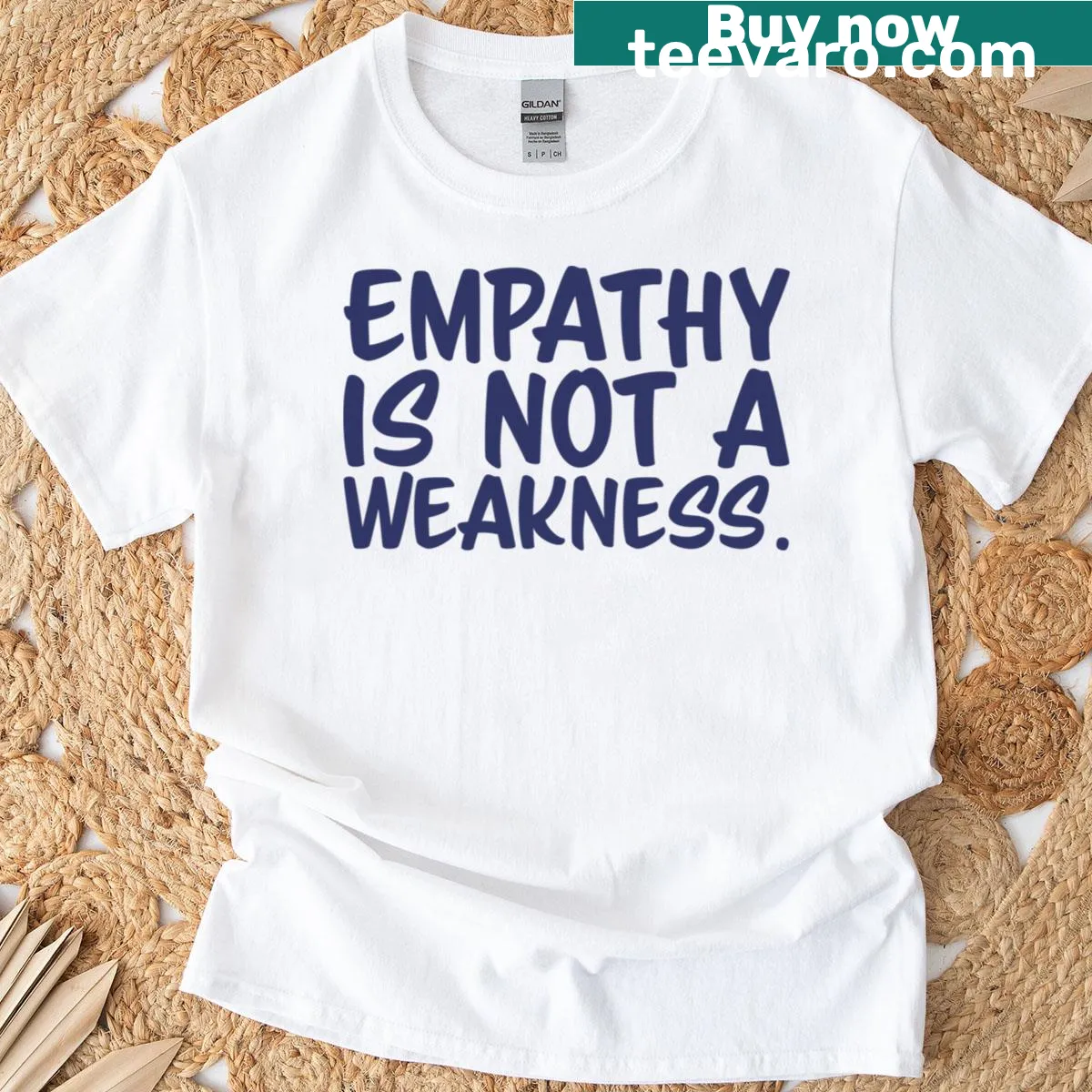 Denim t-shirt featuring the phrase 'Empathy Is Not A Weakness' in bold typography. — on a men's t-shirt