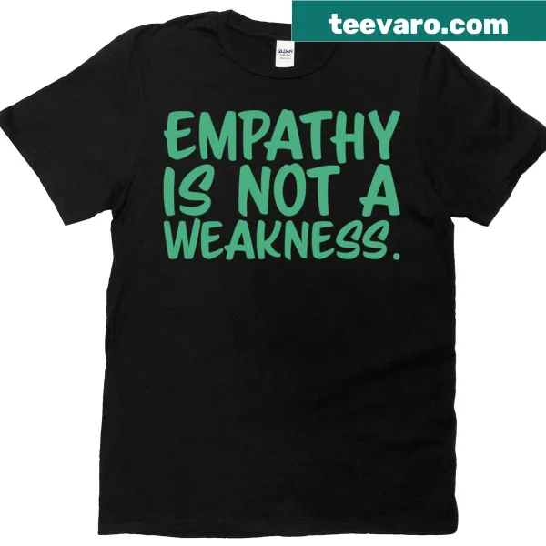 Seafoam T-shirt with bold text promoting empathy.