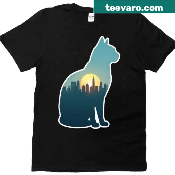Cat silhouette against a cityscape sunset on an oversized T-shirt