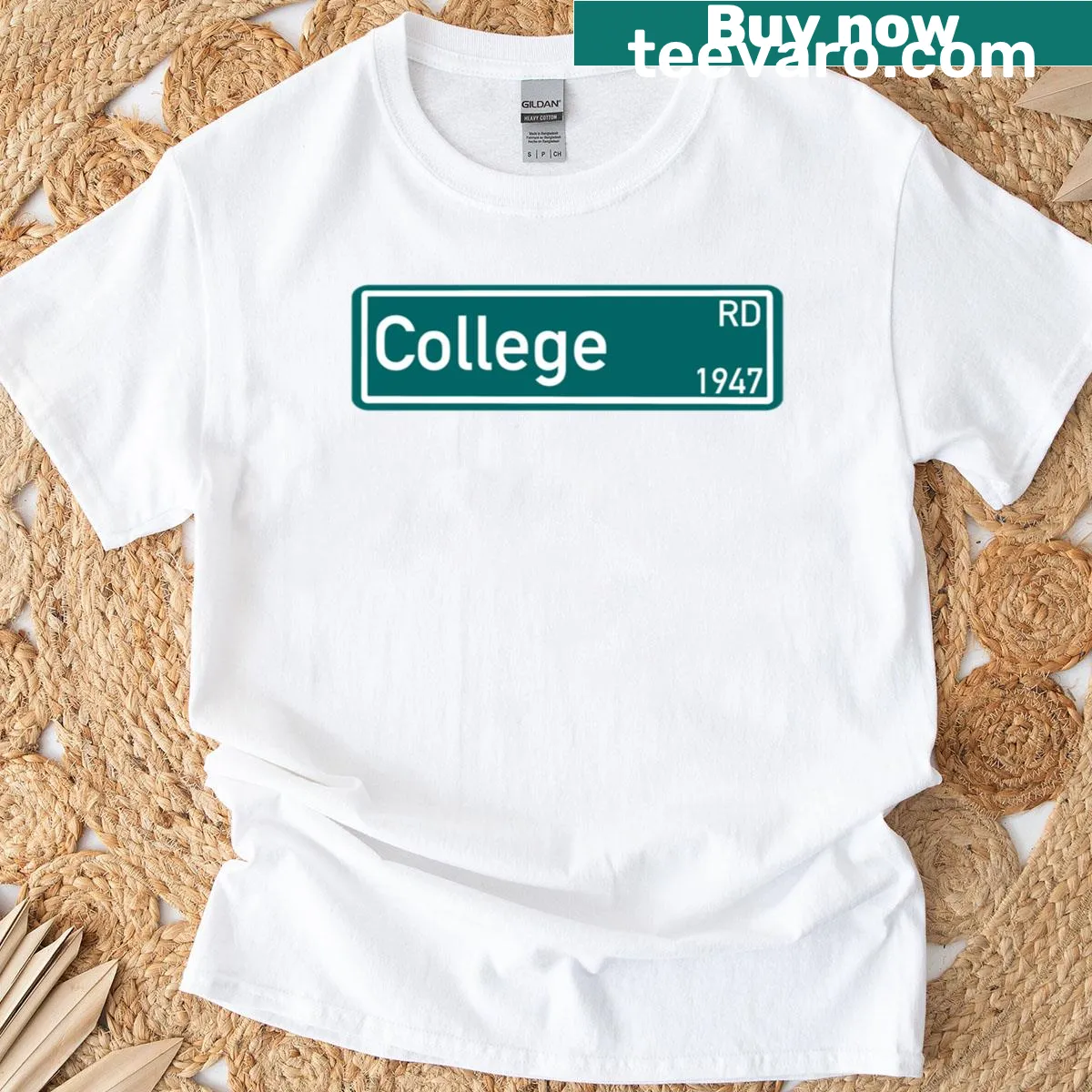 T-shirt featuring a UNC Wilmington street sign graphic — on a men's t-shirt