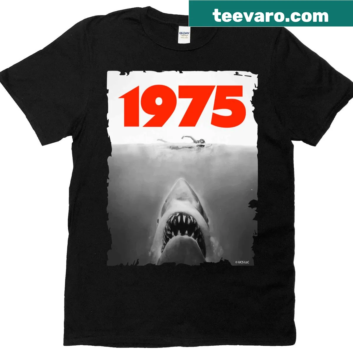 Artistic representation of Jaws 1975 featuring the iconic shark — on a men's t-shirt