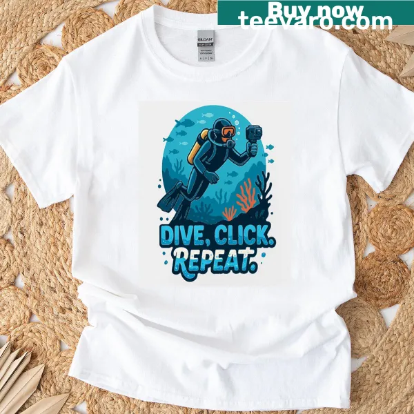 Travel-themed tee with 'Dive Click Repeat' typography design
