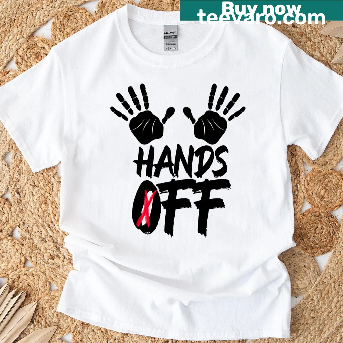 Protest-themed 'Hands Off' graphic on a classic t-shirt — on a men's t-shirt