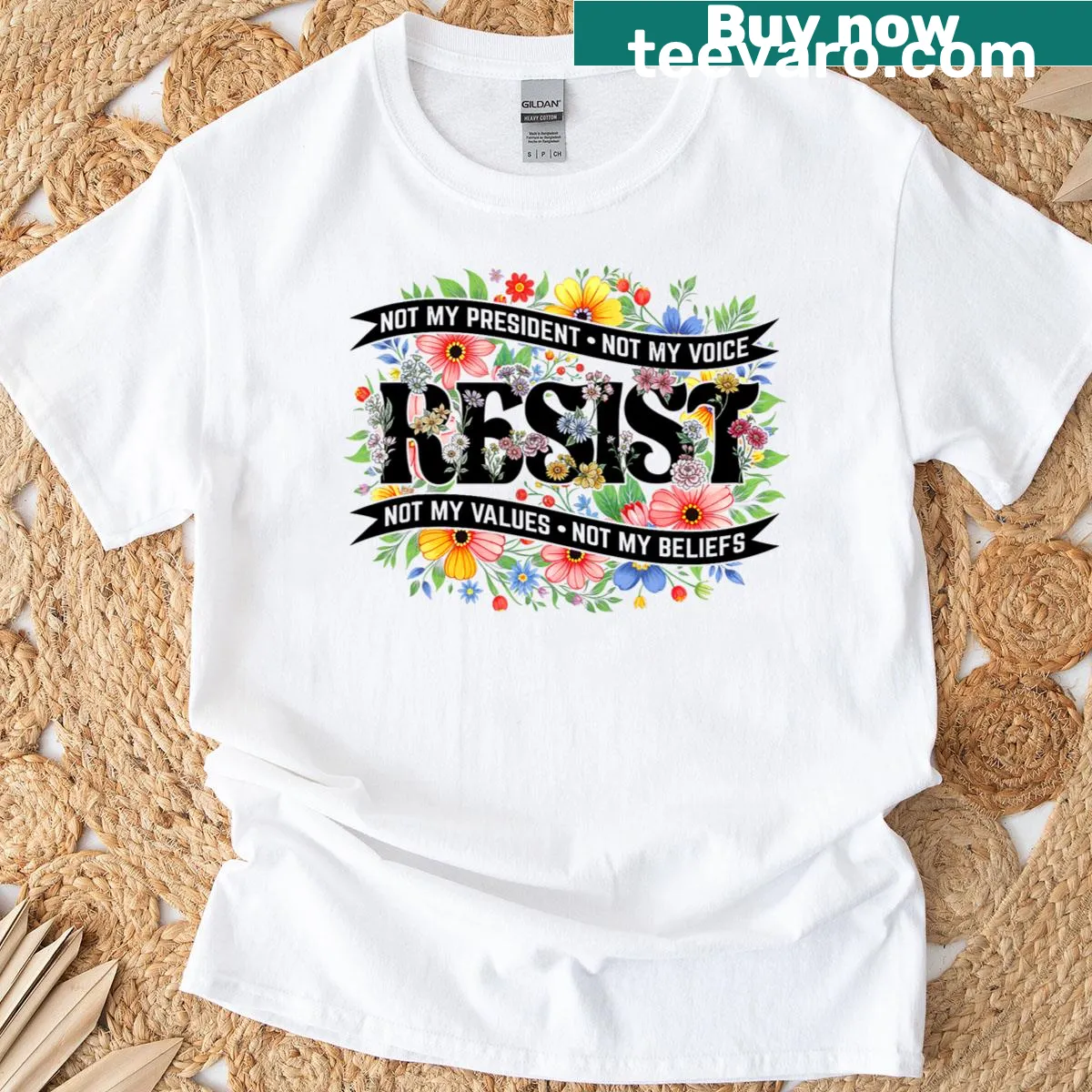 Bold resist graphic surrounded by floral elements on a protest T-shirt — on a men's t-shirt