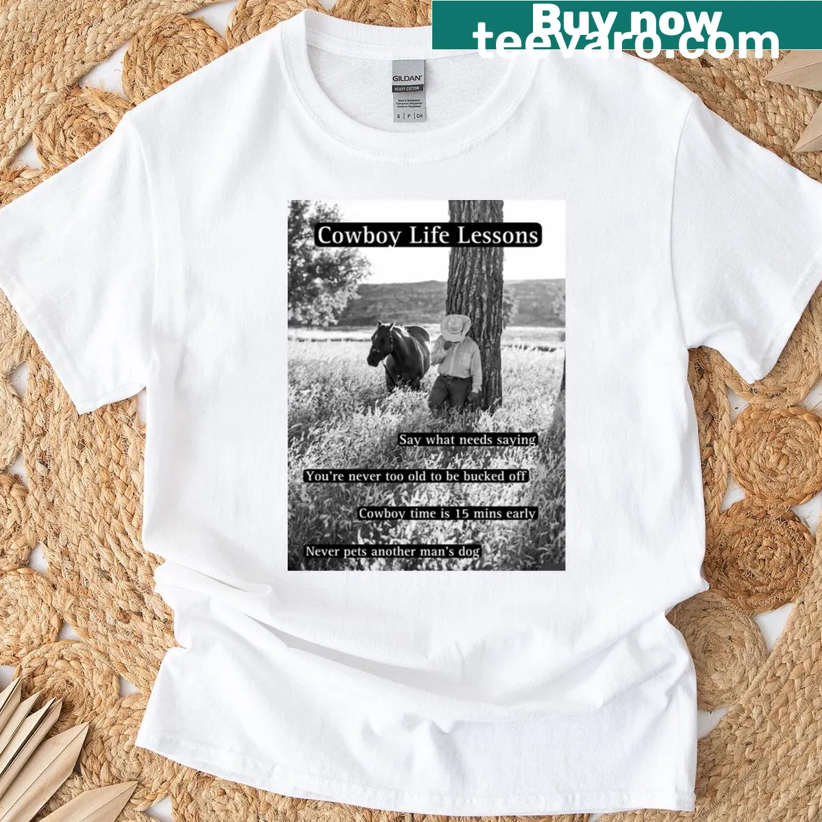 Illustrated cowboy-themed t-shirt conveying life lessons — on a men's t-shirt