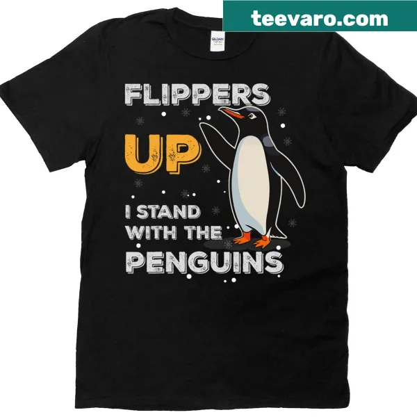 Funny t-shirt featuring cartoon penguins and the phrase 'Flippers Up'