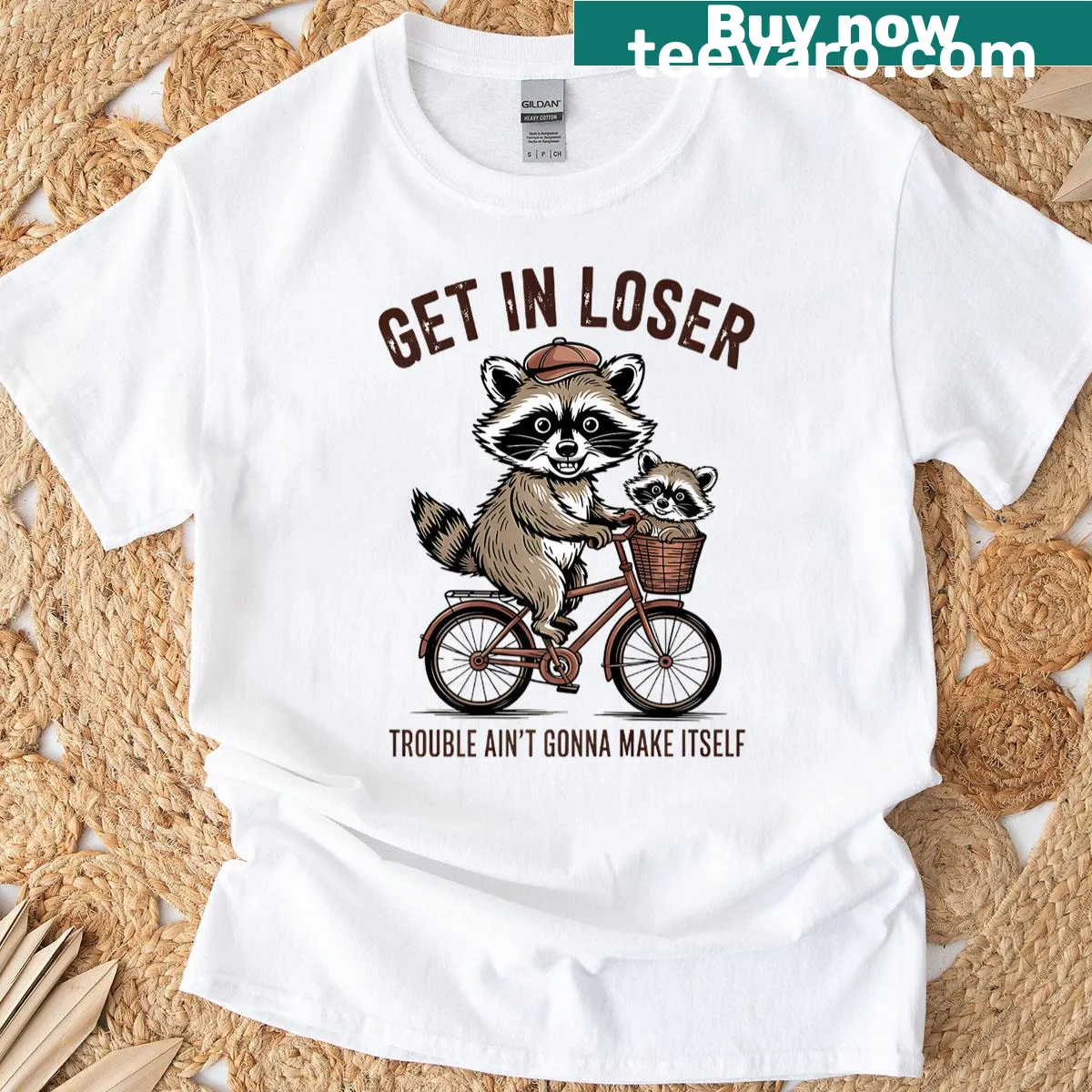 Graphic T-shirt featuring a raccoon and the phrase 'Get In Loser' — on a men's t-shirt