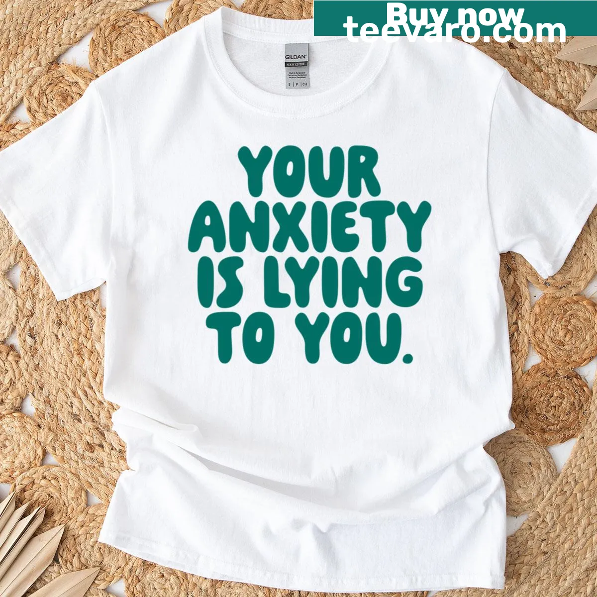 Inspirational T-shirt with message about anxiety and peacock design — on a men's t-shirt