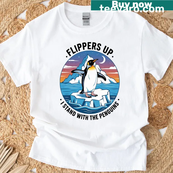 Kids T-shirt featuring cute penguins with the phrase Flippers Up