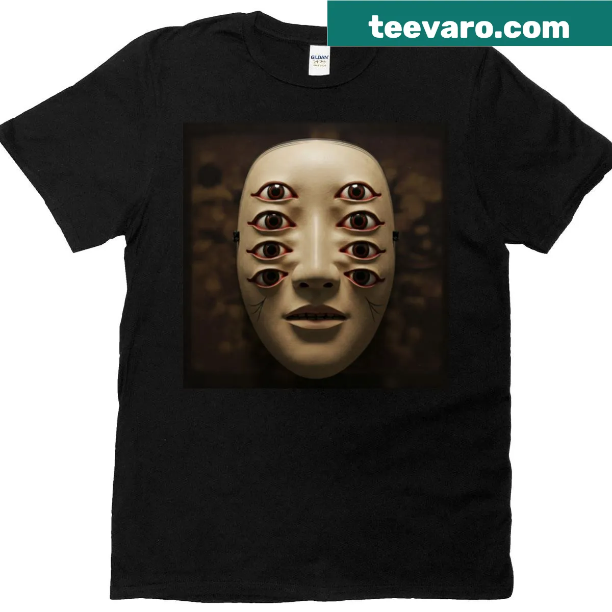Classic T-shirt featuring a surreal multi-eyed mask illustration — on a men's t-shirt