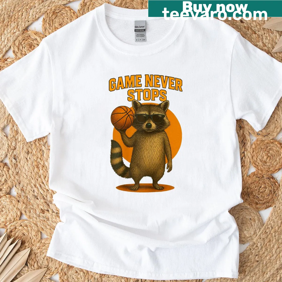 Cartoon raccoon in cowboy attire playing basketball on T-shirt — on a men's t-shirt