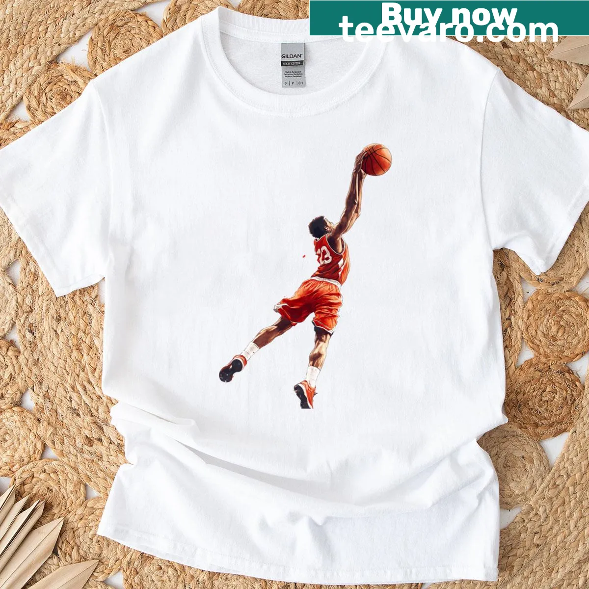 Dynamic basketball player dunking, showcasing power and precision. — on a men's t-shirt