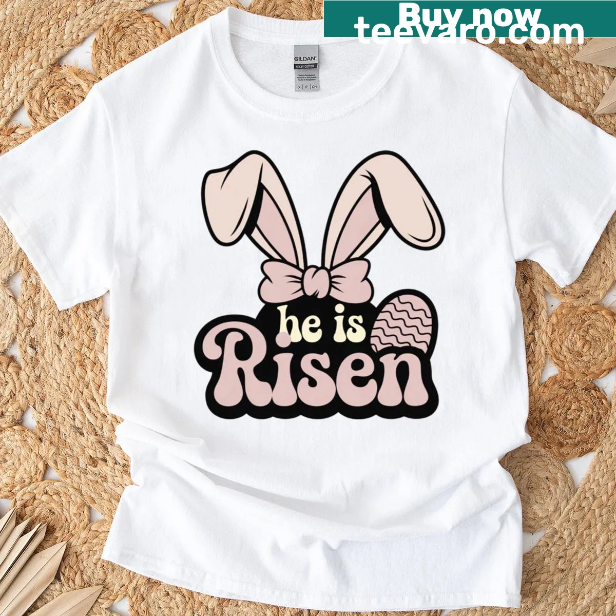 Easter Bunny graphic proclaiming 'He is risen' in a cheerful design. — on a men's t-shirt