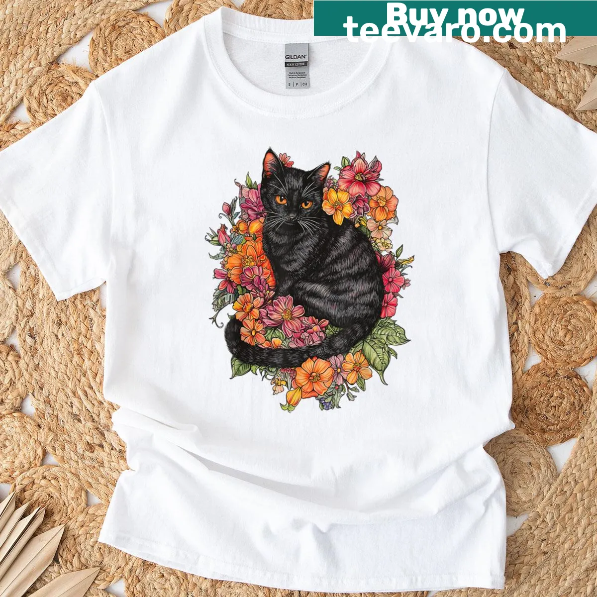 Cute kitten graphic surrounded by flowers — on a men's t-shirt