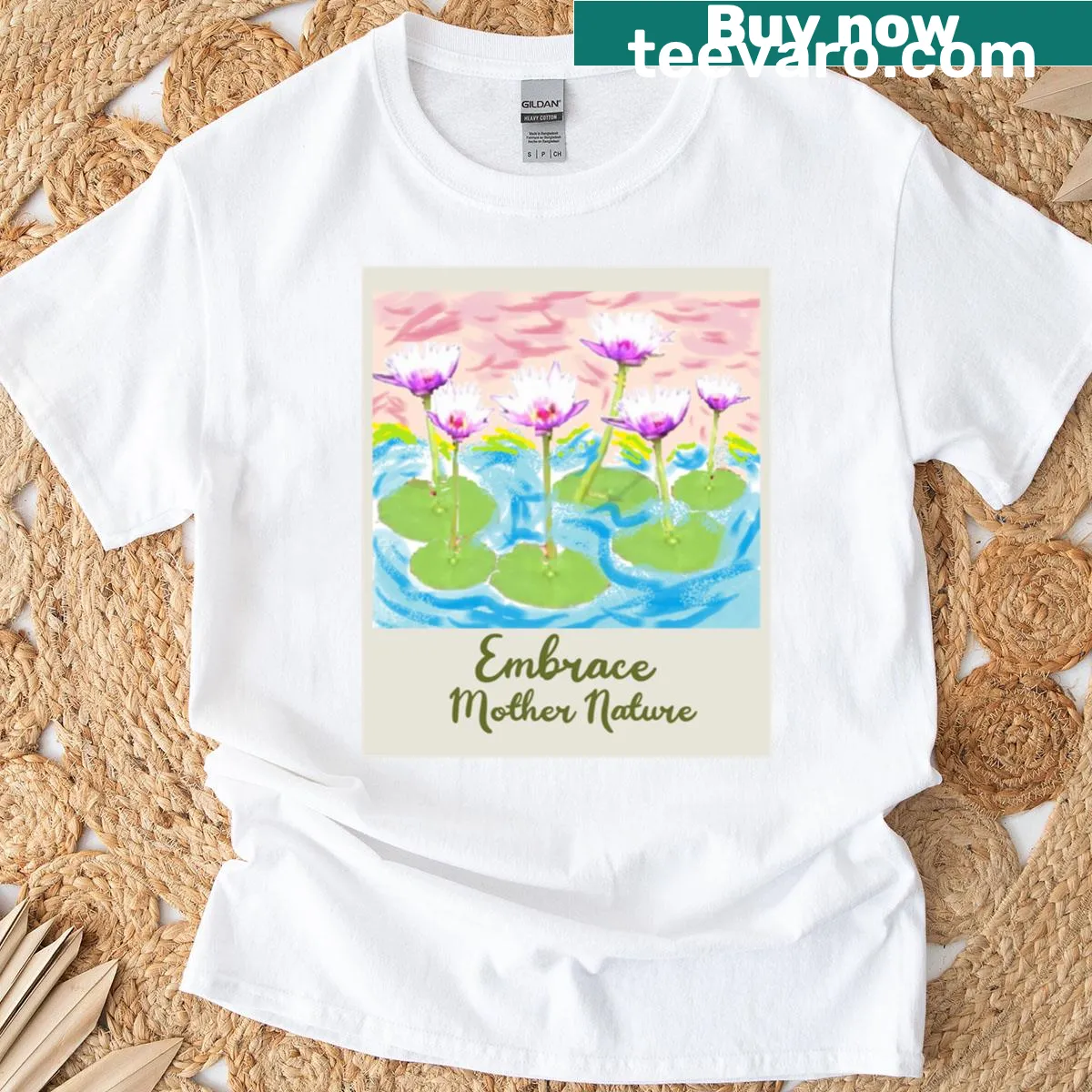 T-shirt with the graphic phrase 'Embrace Mother Nature' alongside nature illustrations. — on a men's t-shirt