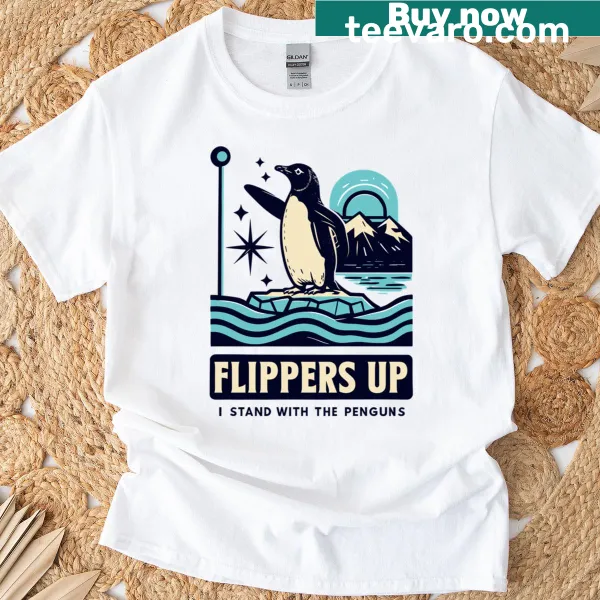 Essential t-shirt featuring cheerful penguin illustration and text
