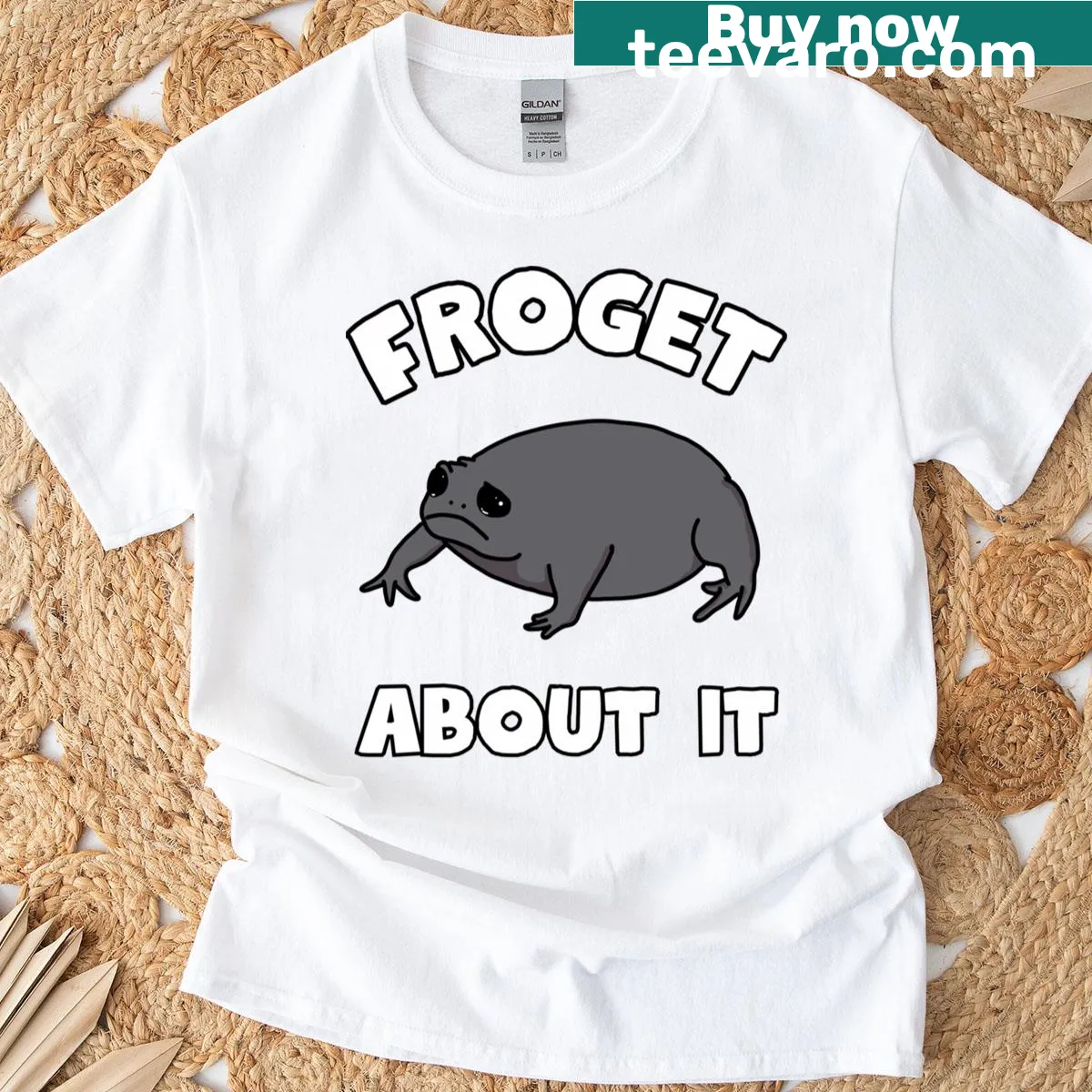 Grumpy frog graphic t-shirt with the phrase Froget About It — on a men's t-shirt
