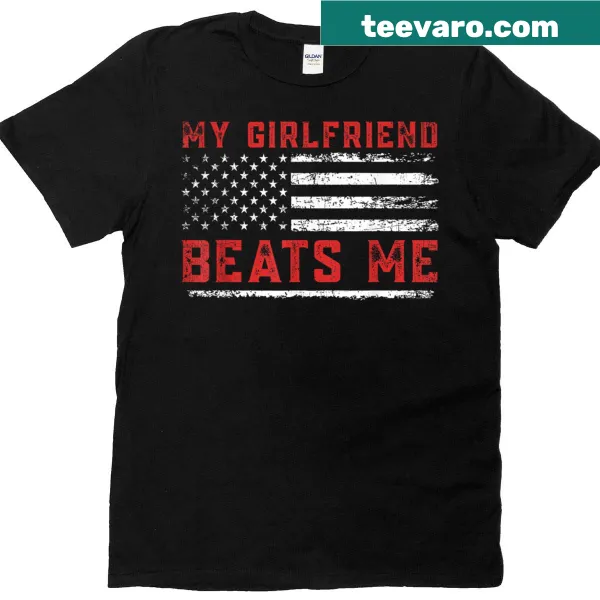 Humorous graphic t-shirt stating 'My Girlfriend Beats Me' in bold text
