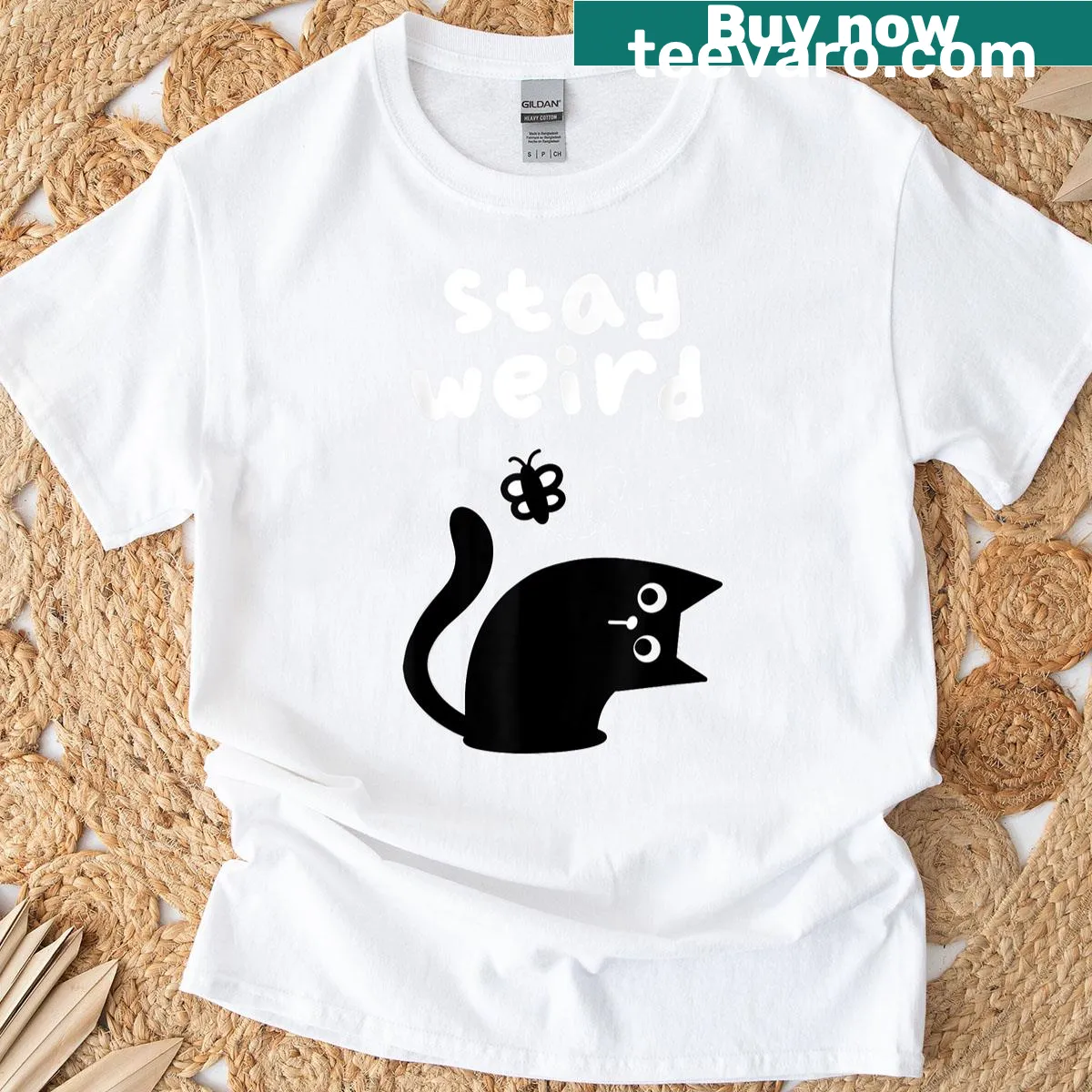 T-shirt with playful message 'Stay Weird' and a cat graphic — on a men's t-shirt