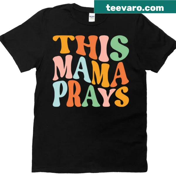 Vintage-style T-shirt with 'This Mama Prays' in retro lettering.