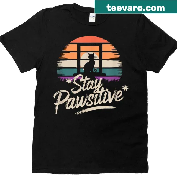 Vintage tee for cat lovers with 'Stay Pawsitive' text and cat illustrations
