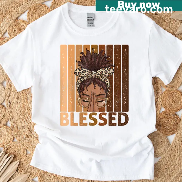 T-shirt featuring an illustration of a praying Black woman, celebrating faith.