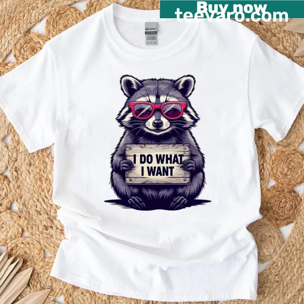 Cartoon t-shirt featuring a playful raccoon with sunglasses