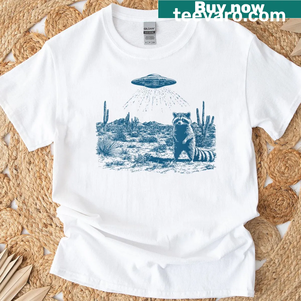 Vintage UFO cowboy raccoon t-shirt with humorous graphic — on a men's t-shirt