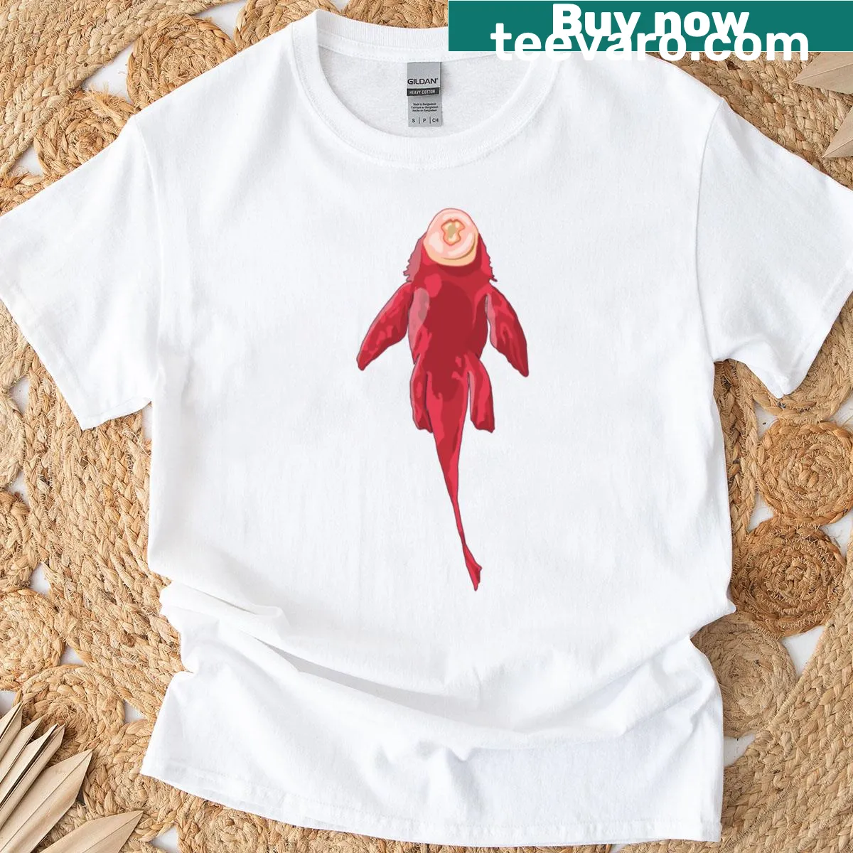 Illustration of a red fish graphic on a t-shirt — on a men's t-shirt