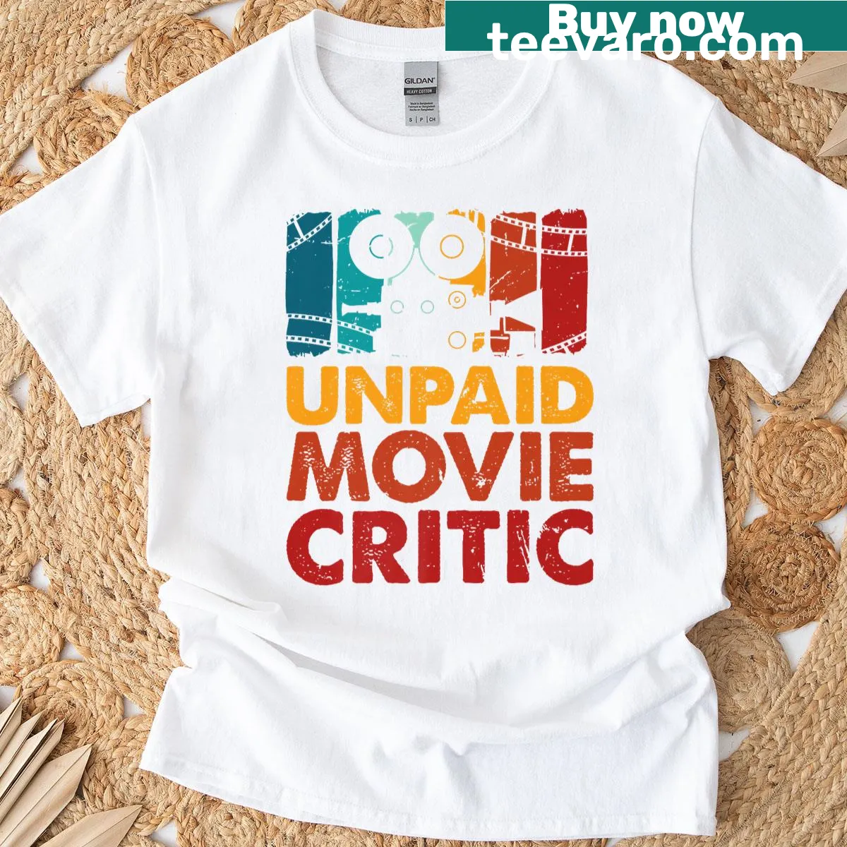 Retro film reel graphic with Unpaid Movie Critic text on a T-shirt — on a men's t-shirt